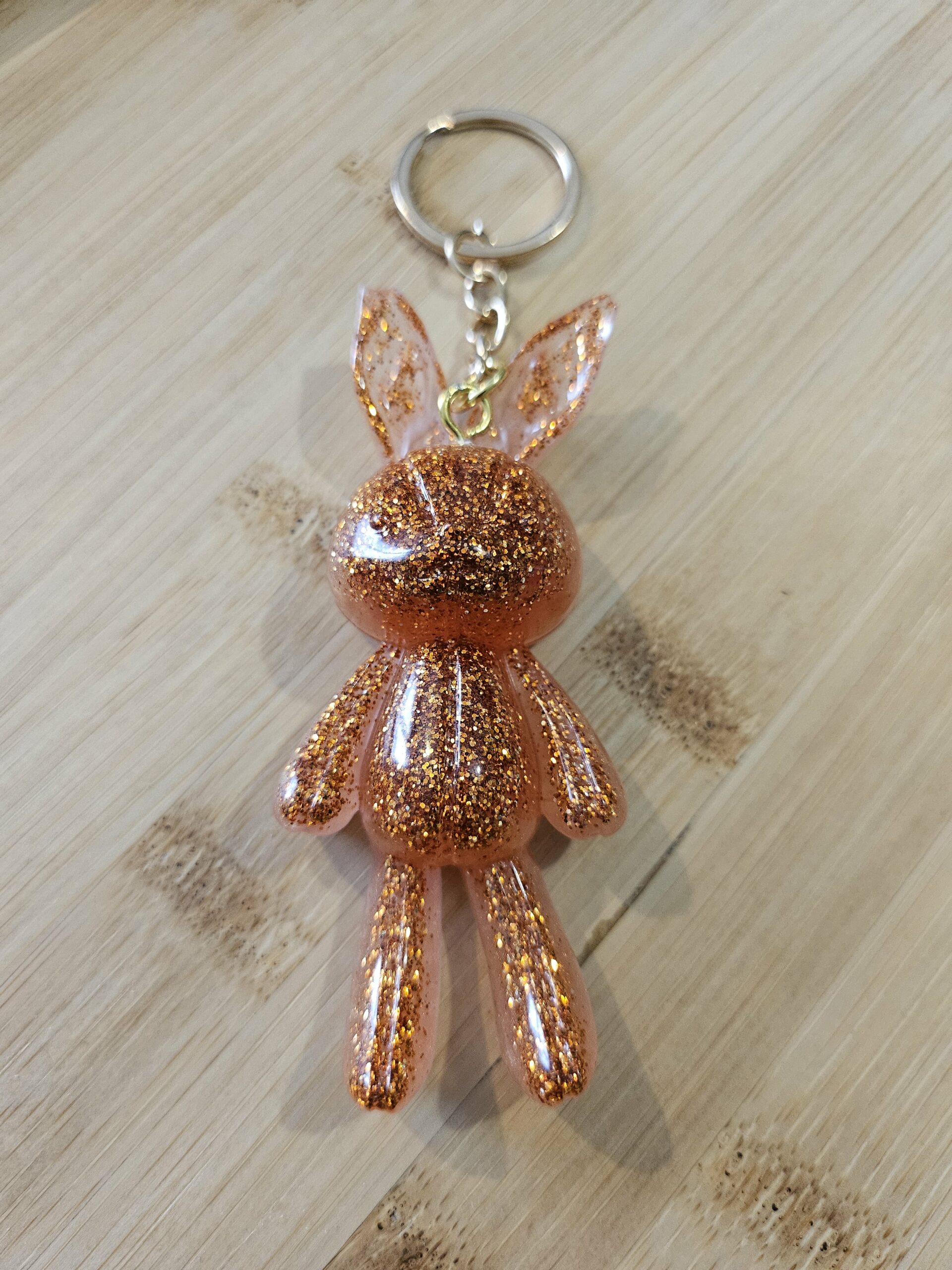 porte clé lapin paillette cuivrée en résine epoxy