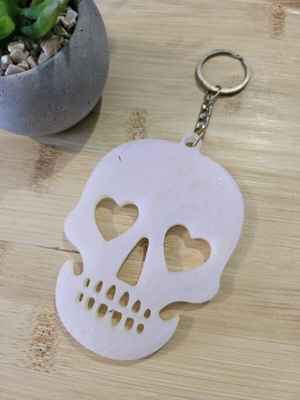 Porte clé skull holographique blanc en résine epoxy