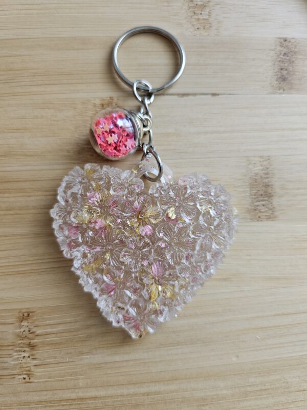 porte cle coeur transparent paillette dorée et rose en résine epoxy