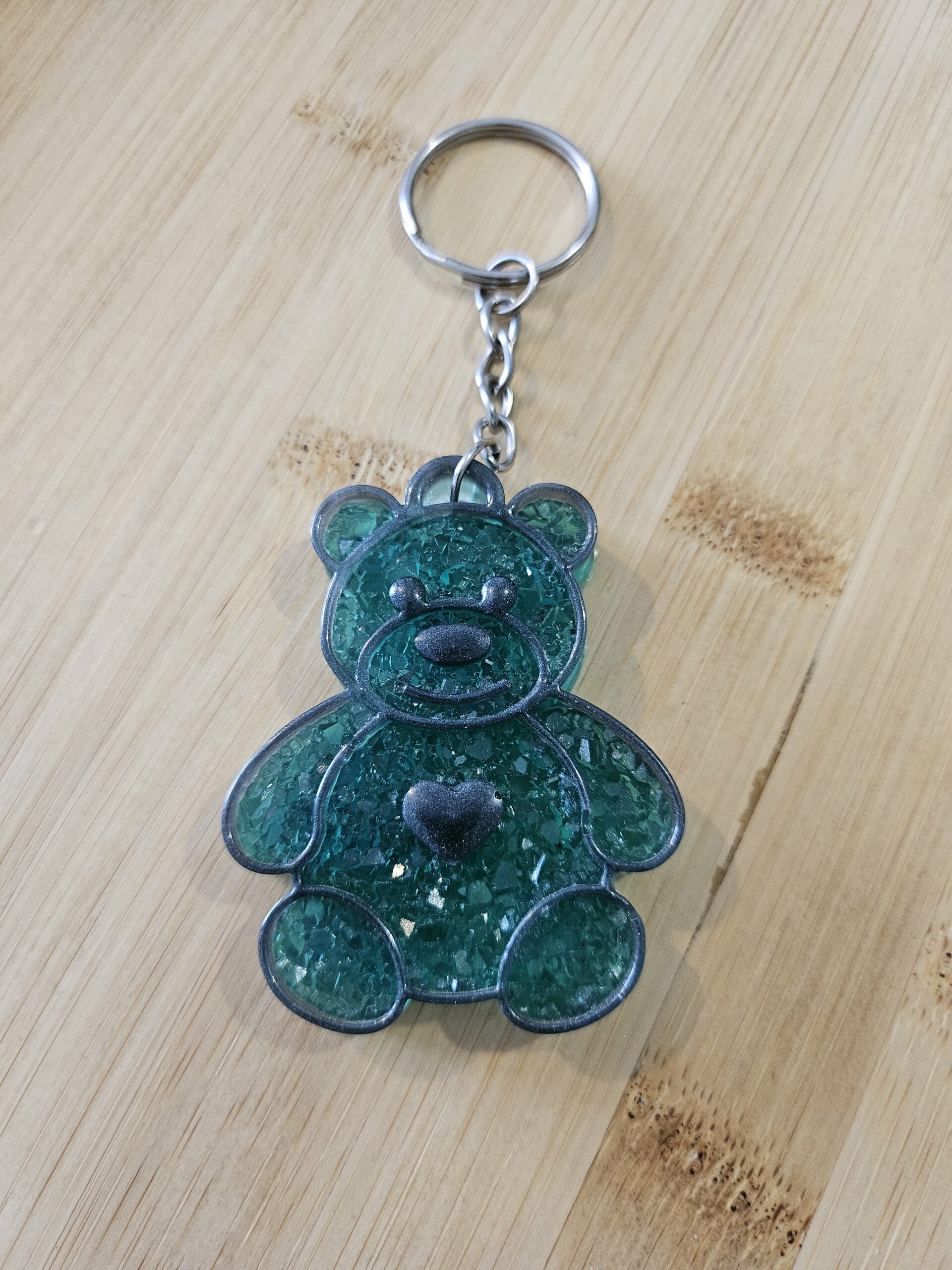 Porte clé nounours effet diamant vert et noir en résine epoxy